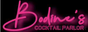 A neon sign that says sodini cocktail bar.